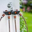 Gardena jakoventtiili asennettuna vesihanaan, neljä letkua kiinnitettynä - Vesiletkuliittimet - 4078500819442 - 2