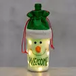 Valoa tuova lahjapussi viini ja glögipullon paketointiin, lumiukkokuvio - Paketointi - 6410416494814 - 2